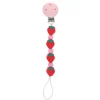 Attache tétine fraise silicone