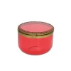 Boite ronde rose en verre et laiton