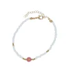 Bracelet blanc à perle cœur