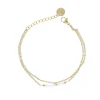 Bracelet chaîne double dorée et perles blanches