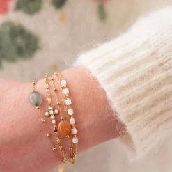 Bracelet doré croix blanche
