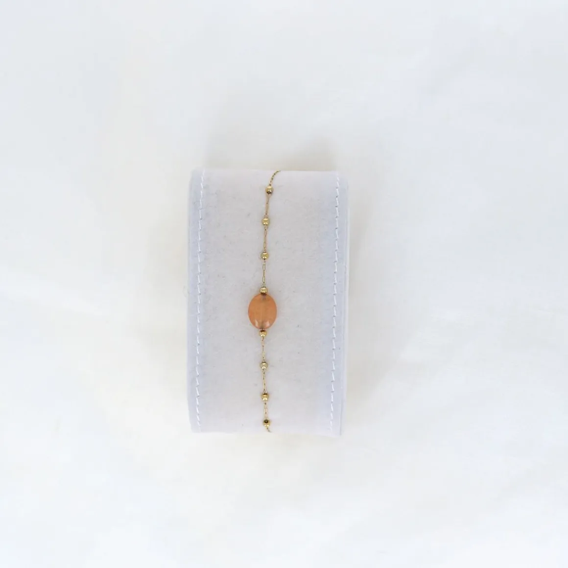 Bracelet doré pierre orangée