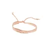 Bracelet tissé avec perles rose pâle