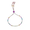 Bracelet tissé en perles mot "Bisou"