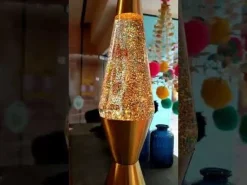 Lampe à lave dorée à paillettes