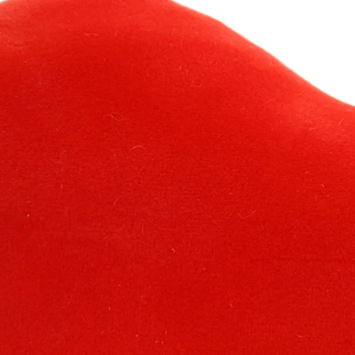 Petit coussin cœur rouge orangé