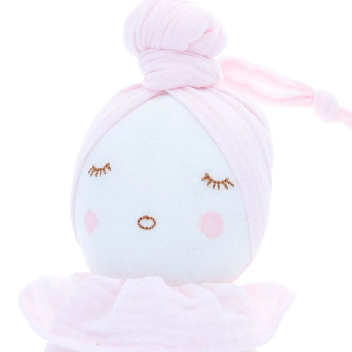 Poupée musicale rose pâle
