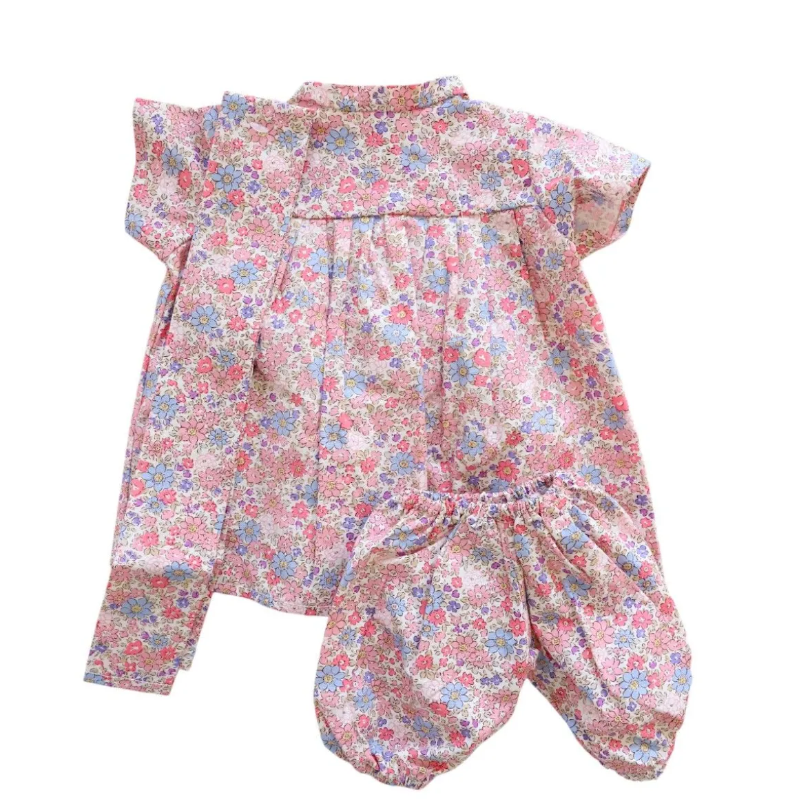 Tenue de poupée Rosie robe fleurie bleu et rose